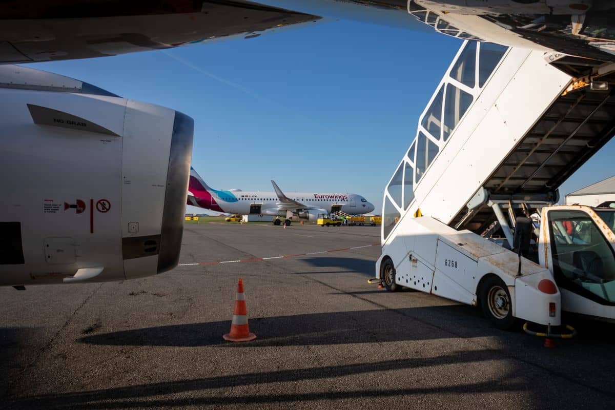Commercial jet parked on the airport tarmac